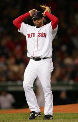 BOSTON - OCTOBER 16:  Pitcher Curtis Leskanic #30 of the Boston Red Sox is taken out of the game in the fourth inning after giving-up a three-run home run to Gary Sheffield #11 of the New York Yankees during game three of the American League Championship 