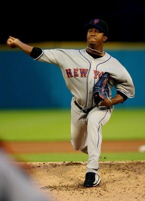 MIAMI - APRIL 01:  Starting pitcher Pedro Martinez #45 of the New York Mets pitches in the first inning against the Florida Marlins at Dolphin Stadium on April 1, 2008 in Miami, Florida.  (Photo by Doug Benc/Getty Images)  