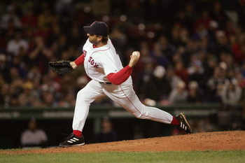 BOSTON - OCTOBER 17:  Mike Myers #36 of the Boston Red Sox pitches against the New York Yankees during game four of the American League Championship Series on October 17, 2004 at Fenway Park in Boston, Massachusetts.  The Red Sox won 6-4. (Photo by Doug P