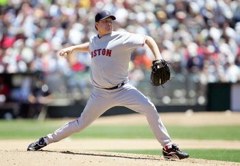 OAKLAND, CA - JUNE 07: Curt Schilling #38 of the Boston Red Sox pitches against the Oakland Athletics during a Major League Baseball game June 7, 2007 at McAfee Coliseum in Oakland, California. (Photo by Jed Jacobsohn/Getty Images)