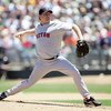 OAKLAND, CA - JUNE 07: Curt Schilling #38 of the Boston Red Sox pitches against the Oakland Athletics during a Major League Baseball game June 7, 2007 at McAfee Coliseum in Oakland, California. (Photo by Jed Jacobsohn/Getty Images)