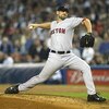 BRONX, NY - OCTOBER 8:  Pitcher Scott Williamson #48 of the Boston Red Sox pitches against the New York Yankees during game 1 of the American League Championship Series on October 8, 2003 at Yankee Stadium in the Bronx, New York.  The Red Sox won 5-2 as W