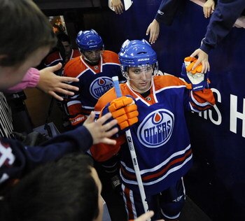 EDMONTON, AB - OCTOBER 3:  Sam Gagner of the Edmonton Oilers walks to the ice before a game between the Calgary Flames and the Edmonton Oilers in an NHL game on October 3, 2009 at Rexall Arena in Edmonton, Canada. The Calgary Flames defeated the Edmonton 