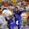 BOISE, ID - SEPTEMBER 3:  Kellen Moore #11 of Boise State throws a pass against the Oregon Ducks in first quarter of the game on September 3, 2009 at Broncos Stadium in Boise, Idaho. (Photo by Steve Dykes/Getty Images)