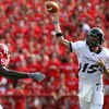PISCATAWAY, NJ - SEPTEMBER 07:  Tony Pike #15 of the Cincinnati Bearcats throws a pass against the Rutgers Scarlet Knights at Rutgers Stadium on September 7, 2009 in Piscataway, New Jersey.   by Jim McIsaac/Getty Images)  (Photo by Jim McIsaac/Getty Image