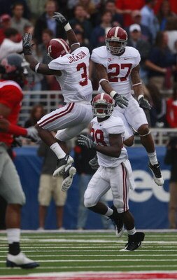 OXFORD, MS - OCTOBER 10:  Kareem Jackson #3, Justin Woodall #27 and Javier Arenas #28 of the Alabama Crimson Tide react after a turnover in their game against the Mississippi Rebels at Vaught-Hemingway Stadium on October 10, 2009 in Oxford, Mississippi. (