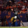 MIAMI - JANUARY 01:  Tony Pike #15 of the Cincinnati Bearcats passes against the Virginia Tech Hokies during the FedEx Orange Bowl at Dolphin Stadium on January 1, 2009 in Miami, Florida.  (Photo by Marc Serota/Getty Images)