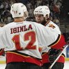 TAMPA, FL - MAY 25: Robyn Regehr #28 of the Calgary Flames congratulates teammate Jarome Iginla #12 after Iginla scored an unassisted shorthanded goal against the Tampa Bay Lightning in game one of the NHL Stanley Cup Finals on May 25, 2004 at the St. Pet