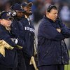 SOUTH BEND, IN - OCTOBER 03: Head coach Charlie Weis of the Notre Dame Fighting Irish and his staff watch as their team takes on the Washington Huskies on October 3, 2009 at Notre Dame Stadium in South Bend, Indiana. Notre Dame defeated Washington 37-30 i