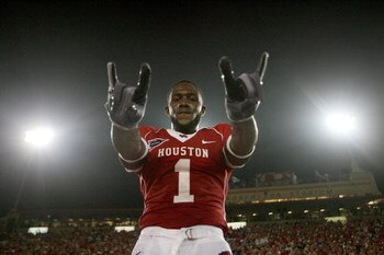 HOUSTON - SEPTEMBER 26: A.J. Dugat of the Houston Cougars celebrates the UH win against Texas Tech Red Raiders at Robertson Stadium on September 26, 2009 in Houston, Texas.  (Photo by Thomas B. Shea/Getty Images)