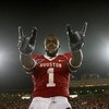 HOUSTON - SEPTEMBER 26: A.J. Dugat of the Houston Cougars celebrates the UH win against Texas Tech Red Raiders at Robertson Stadium on September 26, 2009 in Houston, Texas.  (Photo by Thomas B. Shea/Getty Images)
