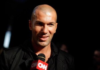 NEW YORK - SEPTEMBER 13:  Former French national footballer Zinedine Zidane speaks backstage before the Y-3 Spring 2010 Fashion Show at the Park Avenue Armory on September 13, 2009 in New York City.  (Photo by Jemal Countess/Getty Images for Y-3)