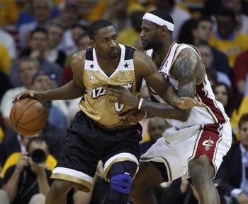 CLEVELAND - APRIL 21:  Gilbert Arenas #0 of the Washington Wizards tries to get around LeBron James #23 of the Cleveland Cavaliers in Game Two of the Eastern Conference Quarterfinals during the 2008 NBA Playoffs at Quicken Loans Arena April 21, 2008 in Cl
