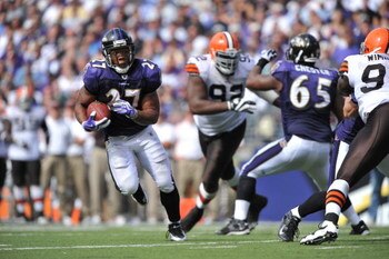 BALTIMORE - SEPTEMBER 27:  Ray Rice #27 of the Baltimore Ravens runs the ball for his first career touchdown against the Cleveland Browns at M&T Bank Stadium on September 27, 2009 in Baltimore, Maryland. The Ravens defeated the Browns 34-3. (Photo by Larr