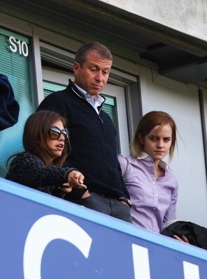 LONDON - MARCH 15: Chelsea owner Roman Abramovich looks on with his girlfriend Daria Zhukova and actress Emma Watson (R) during the Barclays Premier League match between Chelsea and Manchester City at Stamford Bridge on March 15, 2009 in London, England. 