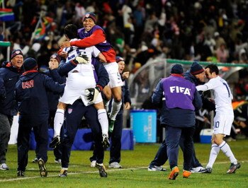 BLOEMFONTEIN, SOUTH AFRICA - JUNE 24:  Benny Feilhaber #22, Charlie Davies #9 and Landon Donovan #10 of USA celebrate with their teammates on the sideline after a goal by Clint Dempsey #8 against Spain during the FIFA Confederations Cup Semi Final match b