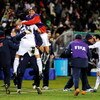 BLOEMFONTEIN, SOUTH AFRICA - JUNE 24:  Benny Feilhaber #22, Charlie Davies #9 and Landon Donovan #10 of USA celebrate with their teammates on the sideline after a goal by Clint Dempsey #8 against Spain during the FIFA Confederations Cup Semi Final match b