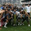 CHICAGO - JUNE 24:  Team USA celebrates with the trophy after their 2-1 win against Mexico during the CONCACAF Gold Cup Final match at Soldier Field on June 24, 2007 in Chicago, Illinois.  (Photo by Jonathan Daniel/Getty Images)