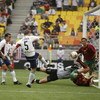 SUWON - JUNE 5:  John O'Brien of the USA scores the opening goal during the first half of the Portugal v USA, Group D, World Cup Group Stage match played at the Suwon World Cup Stadium, Suwon, South Korea on June 5, 2002. USA won the match 3 - 2. (Photo b