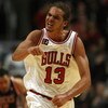 CHICAGO - MARCH 06:  Joakim Noah #13 of the Chicago Bulls reacts after dunked the ball in the second quarter against the Milwaukee Bucks at the United Center on March 6, 2009 in Chicago, Illinois.  NOTE TO USER: User expressly acknowledges and agreees tha