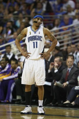 ORLANDO, FL - JUNE 14:  Courtney Lee #11 of the Orlando Magic stands on the court during Game Five of the 2009 NBA Finals against the Los Angeles Lakers on June 14, 2009 at Amway Arena in Orlando, Florida. The Lakers won 99-86. NOTE TO USER:  User express