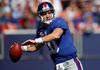 EAST RUTHERFORD, NJ - OCTOBER 11:  Eli Manning #10 of the New York Giants drops back to pass against the Oakland Raiders during the game on October 11, 2009 at Giants Stadium in East Rutherford, New Jersey.  (Photo by Jared Wickerham/Getty Images)