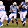 OAKLAND, CA - SEPTEMBER 14:  LaDainian Tomlinson #21 of the San Diego Chargers runs with the ball during their game against the Oakland Raiders on September 14, 2009 at the Oakland-Alameda County Coliseum in Oakland, California.  (Photo by Ezra Shaw/Getty