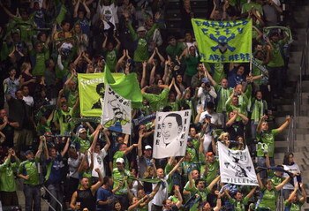 CARSON, CA - AUGUST 15:  Seattle Sounders FC fans attending the match between Seattle Sounders FC and the Los Angeles Galaxy react after a goal by Fredy Montero #17 of Seattle Sounders FC in the second half during the MLS match at The Home Depot Center on