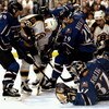 28 Apr 1998:  Tim Taylor #26 of the Boston Bruins fights his way thru Joe Reekie #29 and Joe Juneau #90 of the Washington Capitals during the Bruins 3-0 Eastern Conference playoffs loss at the Fleet Center in Boston, Massachusetts. Mandatory Credit: Craig