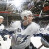UNIONDALE, NY - APRIL 04: Steven Stamkos #91 of the Tampa Bay Lightning turning away from a check against the New York Islanders in a National Hockey League game at Nassau Coliseum on April 4, 2009 in Uniondale, New York. (Photo by Paul Bereswill/Getty Im