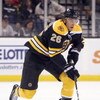 BOSTON, MA - SEPTEMBER 26:  Blake Wheeler #26 of the Boston Bruins skates with the puck against the Columbus Blue Jackets at the TD Banknorth Garden on September 26, 2009 in Boston, Massachusetts.  (Photo by Jim Rogash/Getty Images)