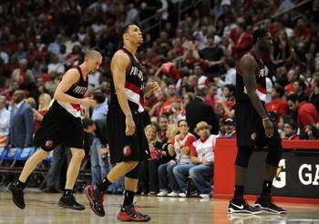 HOUSTON - APRIL 30:  Greg Oden #52, Brandon Roy #7 and Steve Blake #2 of the Portland Trail Blazers walk off the court during play against the Houston Rockets in Game Six of the Western Conference Quarterfinals during the 2009 NBA Playoffs at Toyota Cente