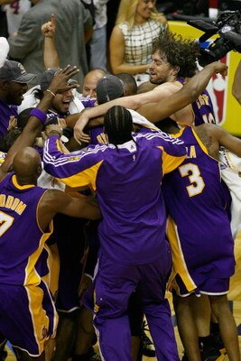 ORLANDO, FL - JUNE 14:  (L-R) Didier Ilunga-Mbenga #28, Lamar Odom #7, Sasha Vujacic #18, Josh Powell #21, Trevor Ariza #3 and Pau Gasol #16 of the Los Angeles Lakers celebrate after defeated the Orlando Magic 99-86 in Game Five of the 2009 NBA Finals on 