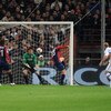 GENOA, ITALY - OCTOBER Esteban Cambiasso of FC Inter Milan scores his team first goal during the Serie A match between Genoa CFC and FC Inter Milan at Stadio Luigi Ferraris on October 17, 2009 in Genoa, Italy.  (Photo by Massimo Cebrelli/Getty Images)
