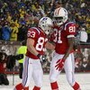 FOXBORO, MA - OCTOBER 18:  Wes Welker #83 of the New England Patriots is congratulated by teammate Randy Moss #81 after Welker scored a touchdown in the second quarter against the Tennessee Titans on October 18, 2009 at Gillette Stadium in Foxboro, Massac