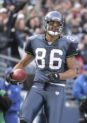 SEATTLE - DECEMBER 11:  Jerramy Stevens #86 of the Seattle Seahawks carries the ball during the game with the San Francisco 49ers on December 11, 2005 at Qwest Field in Seattle, Washington. The Seahawks won 41-3. (Photo by Otto Greule Jr/Getty Images) 