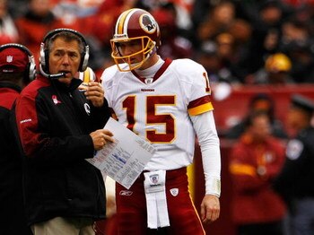 LANDOVER, MD - OCTOBER 18:  Washington Redskins head coach Jim Zorn talks with quarterback Todd Collins #15 during their game against the Kansas Chiefs October 18, 2009 at FedEx Field in Landover, Maryland. The Chiefs won the game 14-6.  (Photo by Win McN