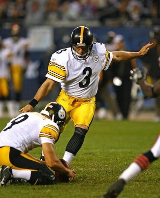 CHICAGO - SEPTEMBER 20: Jeff Reed #3 of the Pittsburgh Steelers attempts a field goal out of the hold of Daniel Sepulveda #9 against the Chicago Bears on September 20, 2009 at Soldier Field in Chicago, Illinois. The Bears defeated the Steelers 17-14. (Pho