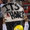 ANAHEIM, CA - OCTOBER 09:  A fan of the Los Angeles Angels of Anaheim dressed as 'Homer Simpson' hold a sign in support of the Angels during Game Two of the ALDS against the Boston Red Sox during the 2009 MLB Playoffs at Angel Stadium on October 9, 2009 i