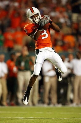 FORT LAUDERDALE, FL - OCTOBER 03: Wide receiver Travis Benjamin #3 of the Miami Hurricanes catches a touchdown pass against the Oklahoma Sooners at Land Shark Stadium on October 3, 2009 in Fort Lauderdale, Florida. Miami defeated Oklahoma 21-20. (Photo by