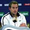 SHANGHAI, CHINA - OCTOBER 13:  Andy Roddick of the United States fields questions from the media at a press conference after retiring from his match against Stanilas Wawrinka of Switzerland during the 2009 Shanghai ATP Masters 1000 at Qi Zhong Tennis Cent