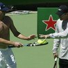 MELBOURNE, AUSTRALIA - JANUARY 15:  Andy Roddick and coach Brad Gilbert of the United States discuss tactics during a training session prior to the 2004 Australian Open at Melbourne Park, January 15, 2004 in Melbourne, Australia. (Photo by Clive Brunskill