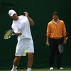 LONDON - JUNE 23:  Andy Roddick of the USA hits a forehand as his coach Jimmy Connors looks on while practicing during previews for the Wimbledon Lawn Tennis Championships at the All England Lawn Tennis and Croquet Club on June 23, 2007 in London, England
