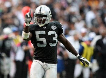 OAKLAND, CA - OCTOBER 18:  Thomas Howard #53 of the Oakland Raiders celebrates after a play against the Philadelphia Eagles during an NFL game at the Oakland-Alameda County Coliseum on October 18, 2009 in Oakland, California.  (Photo by Jed Jacobsohn/Gett