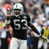 OAKLAND, CA - OCTOBER 18:  Thomas Howard #53 of the Oakland Raiders celebrates after a play against the Philadelphia Eagles during an NFL game at the Oakland-Alameda County Coliseum on October 18, 2009 in Oakland, California.  (Photo by Jed Jacobsohn/Gett