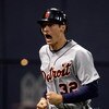 MINNEAPOLIS - OCTOBER 06:  Don Kelly #32 of the Detroit Tigers celebrates after sliding safely into home plate to score during the 10th inning of the American League Tiebreaker game against  the Minnesota Twins on October 6, 2009 at Hubert H. Humphrey Met