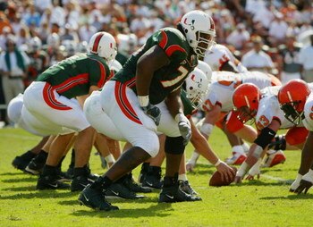 MIAMI - NOVEMBER 15:  Offensive lineman Carlos Joseph #76 of the University of Miami Hurricanes waits for the snap during the game against the Syracuse University Orangemen at the Orange Bowl on November 15, 2003 in Miami, Florida. Miami defeated Syracuse
