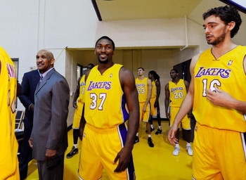 EL SEGUNDO, CA - SEPTEMBER 29:  Ron Artest #37and Pau Gasol #16 of the Los Angeles Lakers arrive Lakers media day at the team's training facility on September 29, 2009 in El Segundo, California.  NOTE TO USER: User expressly acknowledges and agrees that, 