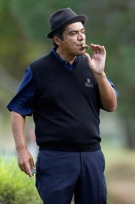 LAS VEGAS - OCTOBER 14:  Actor/comedian George Lopez smokes a cigar during the Justin Timberlake Shriners Hospitals for Children Open Championship Pro-Am at the TPC Summerlin October 14, 2009 in Las Vegas, Nevada.  (Photo by Ethan Miller/Getty Images)