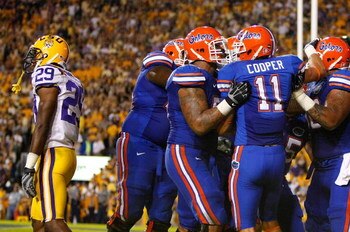 BATON ROUGE, LA - OCTOBER 10:  Riley Cooper #11 of the Florida Gators celebrates after pulling in a touchdown reception against Chris Hawkins #29 of the Louisiana State University Tigers at Tiger Stadium on October 10, 2009 in Baton Rouge, Louisiana.  (Ph